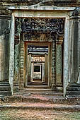 Angkor - Banteay Samre, inner courtyard of the first enclosure, view through doors.